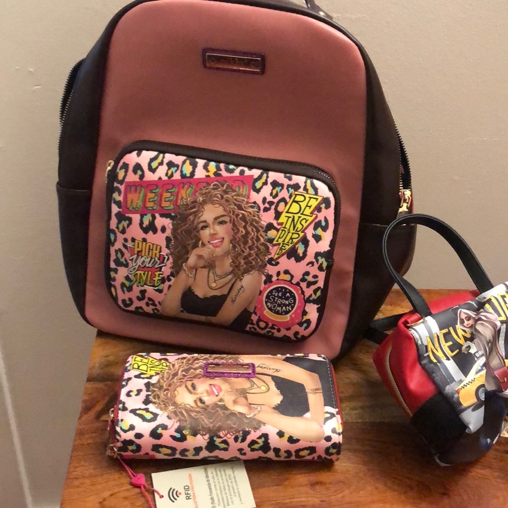 Original Nicole lee back pack purse and wallet and small purse. This is sold .